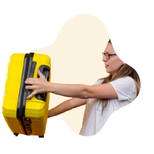 Traveler holding a suitcase securely